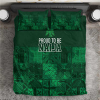 Dark green bedding set with adire-style geometric patchwork and “PROUD TO BE NAJA” text, pillows included