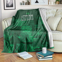 Dark green adire-pattern blanket with 'Proud to be Naija' text and geometric motifs