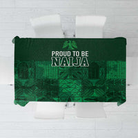 Dark green tablecloth with bold adire-style geometric patterns and Naija text