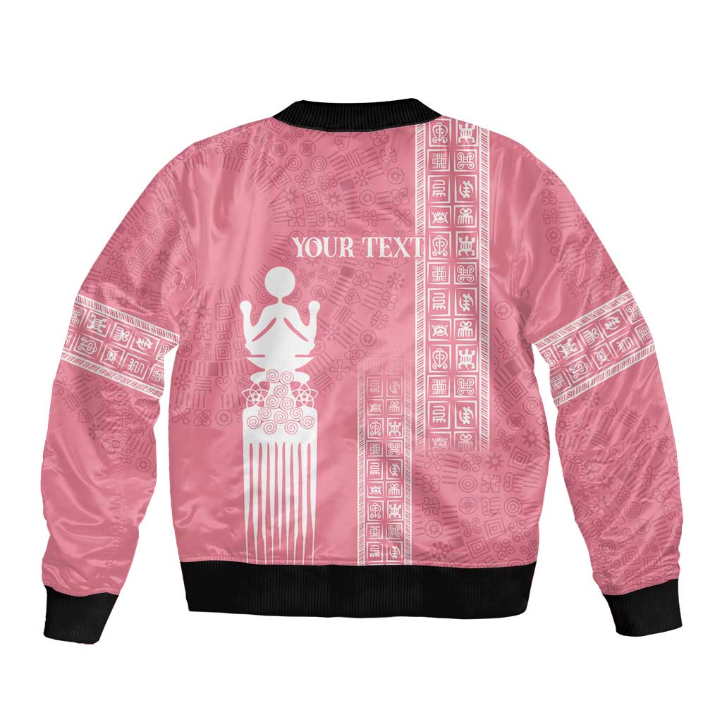 Pink women's bomber jacket with black ribbed hem and collar; back shows 'YOUR TEXT' and symbol