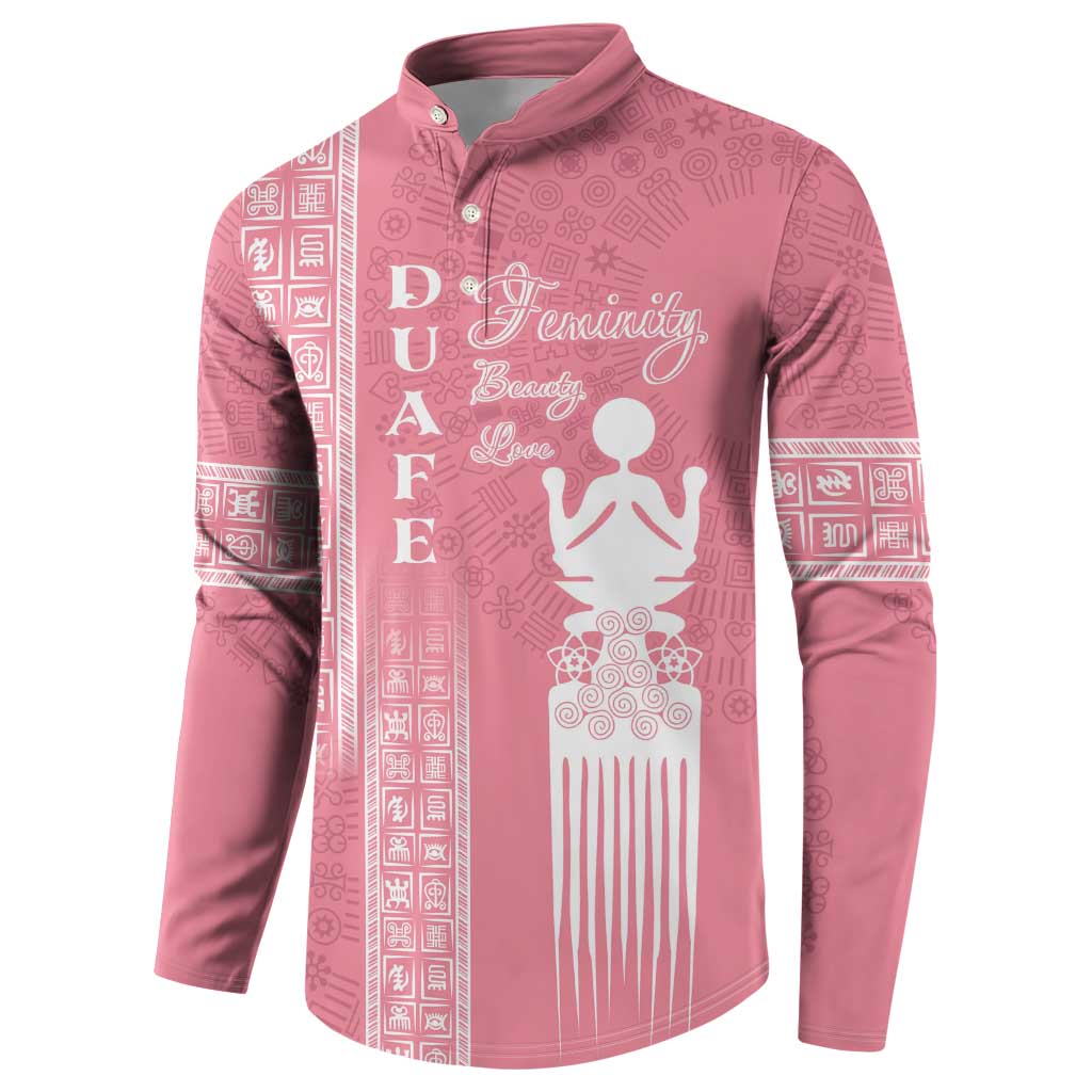 Women's pink long-sleeve button-up sweatshirt with white figure graphic and decorative text