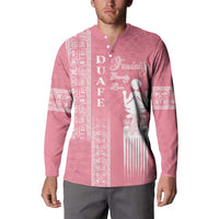 Pink button-up sweatshirt with white figure graphic and long-sleeve patterned side panels
