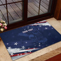 Blue rubber doormat featuring eagle and stars with red-white border and custom text