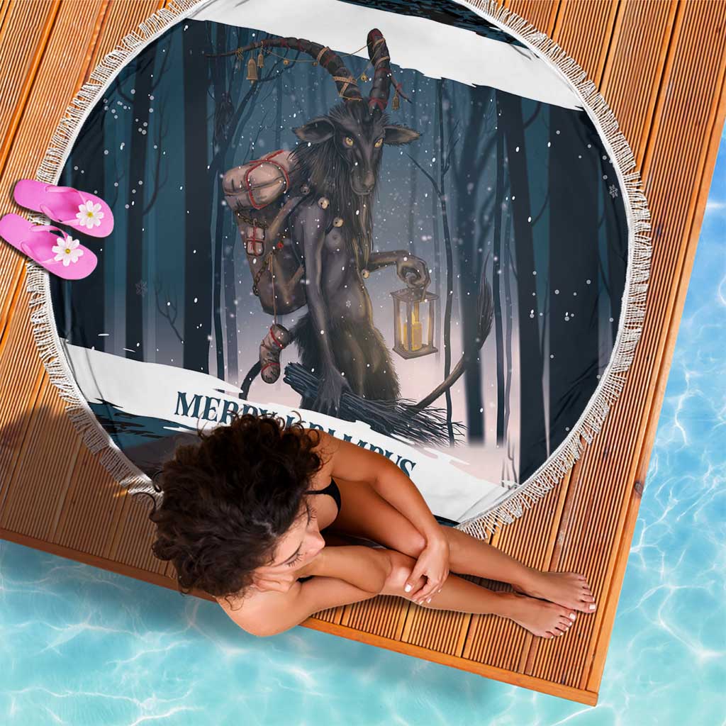 Round dark teal beach blanket featuring Krampus in forest with lantern graphic, fringed edge.