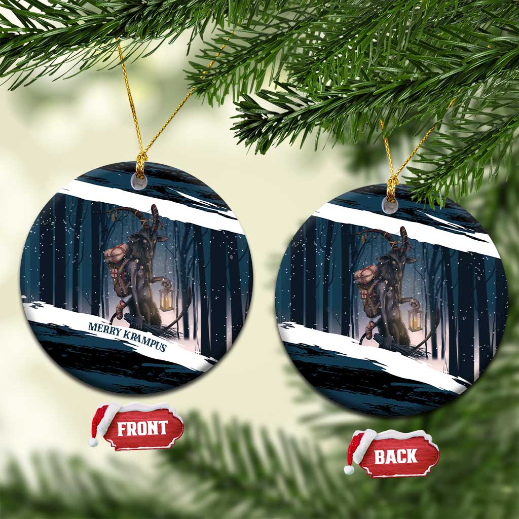 Dark teal ceramic round Christmas ornament with Krampus holding a lantern, gold hanging loop.
