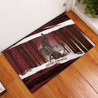 Red rubber doormat featuring Krampus in snowy forest stripes and 'Merry Krampus'