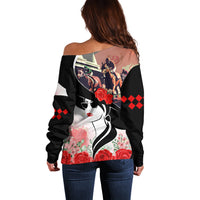 Black off-shoulder sweater, back graphic with horses, roses, and red argyle diamonds