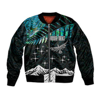 Personalized bomber jacket with teal-black celestial print, 'YOUR TEXT' zip front