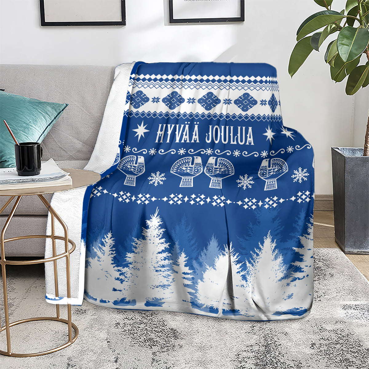 Finland Christmas blanket with blue and white Finnish pattern and Hyvää Joulua text