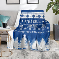 Finland Christmas blanket with blue and white Finnish pattern and Hyvää Joulua text