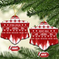 Snowflake ceramic Christmas ornament in red with Finnish pattern, front and back views