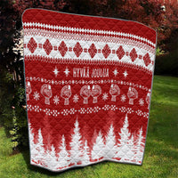 Red Christmas quilt with diamond border, 'HYVAA JOULUA' center and reindeer icons