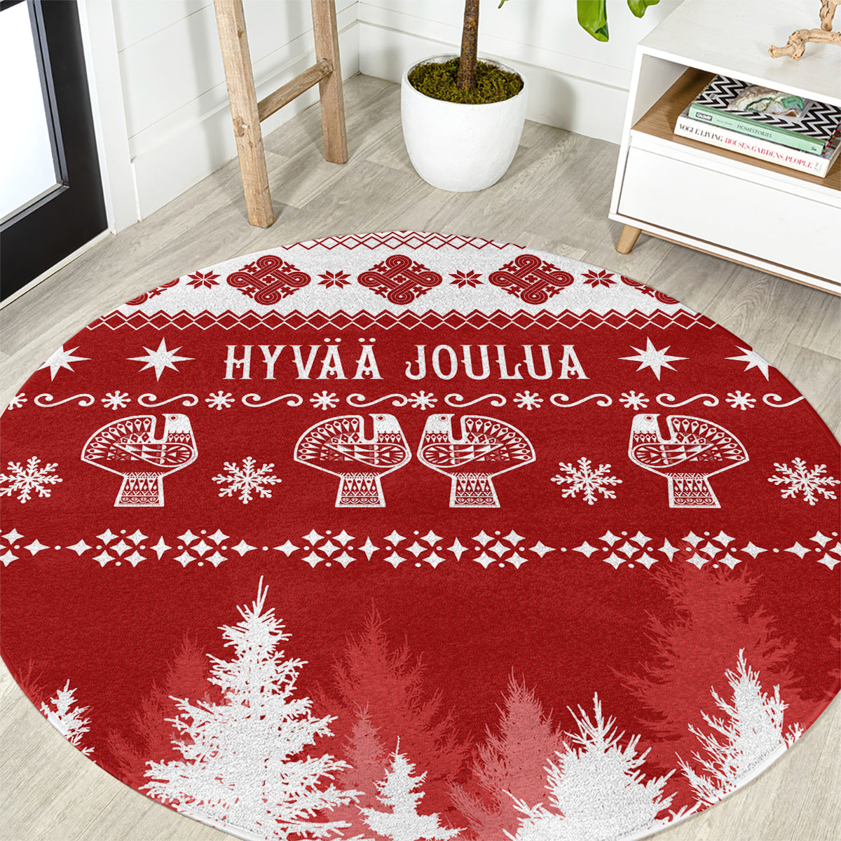 Red round Christmas rug with Hyvaa Joulua text and Nordic festive pattern