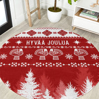 Red round Christmas rug with Hyvaa Joulua text and Nordic festive pattern