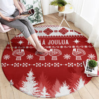 Red round Christmas rug with Hyvaa Joulua and Scandinavian motifs