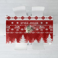 Red and white Christmas tablecloth with 'Hyvaa Joulua' festive pattern