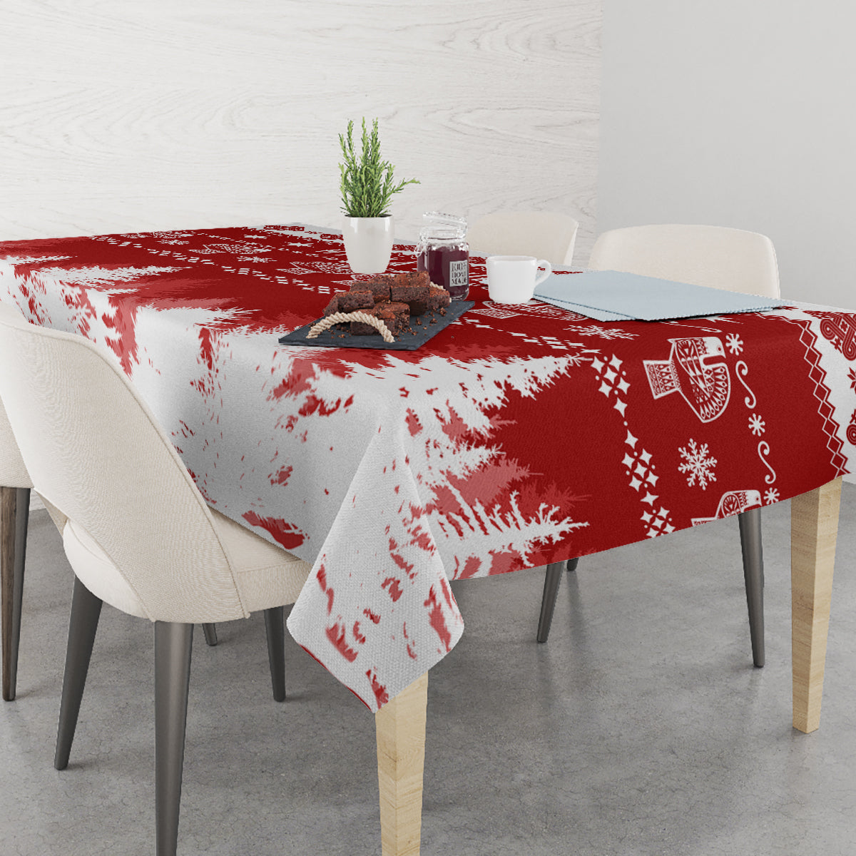 Red and white Christmas tablecloth with starry icons and snowflake pattern on table