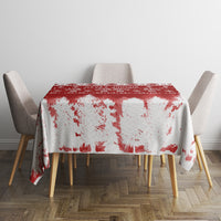 Red and white Christmas tablecloth on round table, snowflake and tree motif print