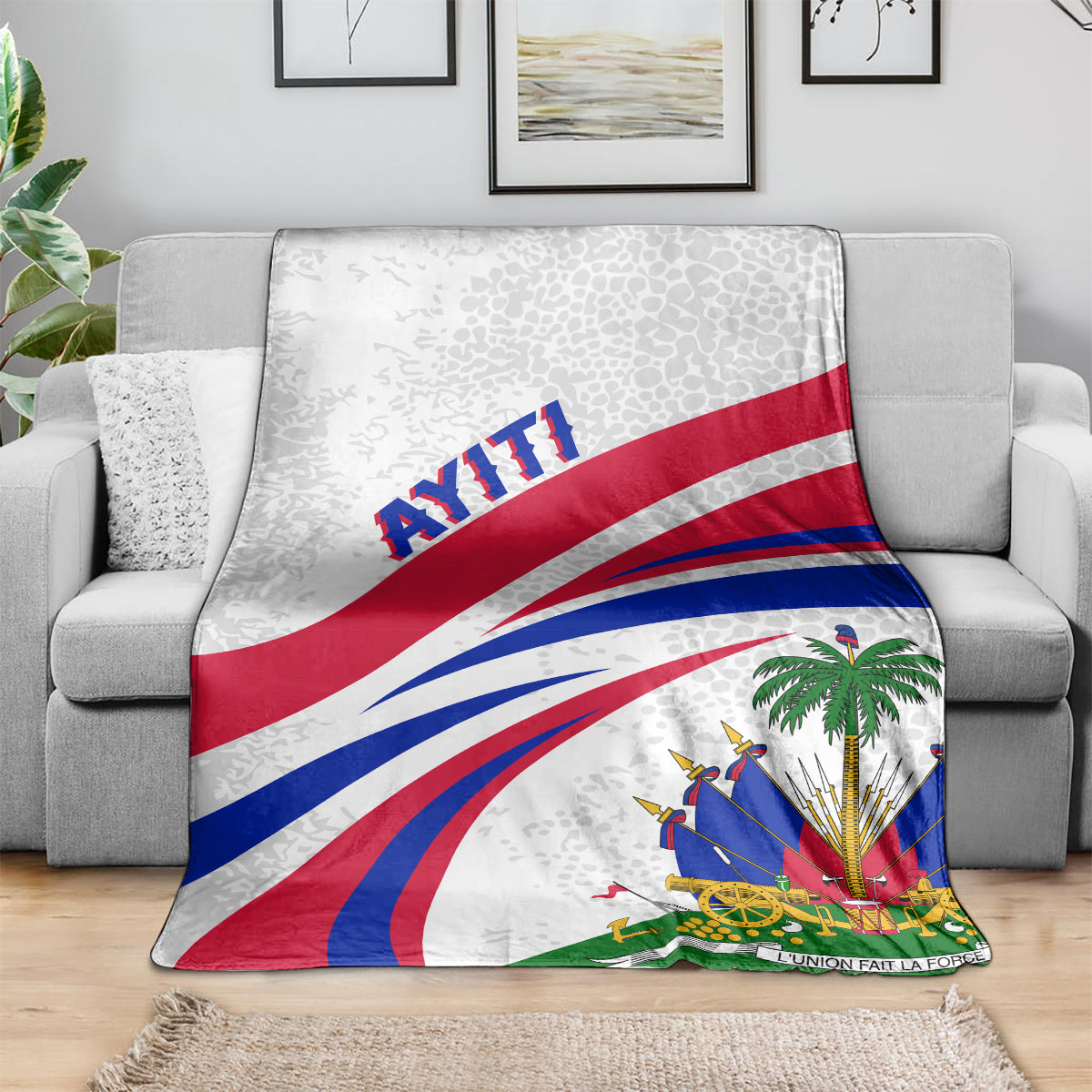 Haiti flag style blanket draped over a sofa, light gray background with blue and red stripes.