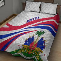 Quilt bed set on bed with two pillows, red white blue flag-style curved pattern