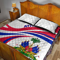 Quilt bed set with two pillows, white quilted base and large red-blue emblem artwork