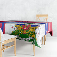 Haiti independence anniversary tablecloth draped on dining table, red blue border with emblem