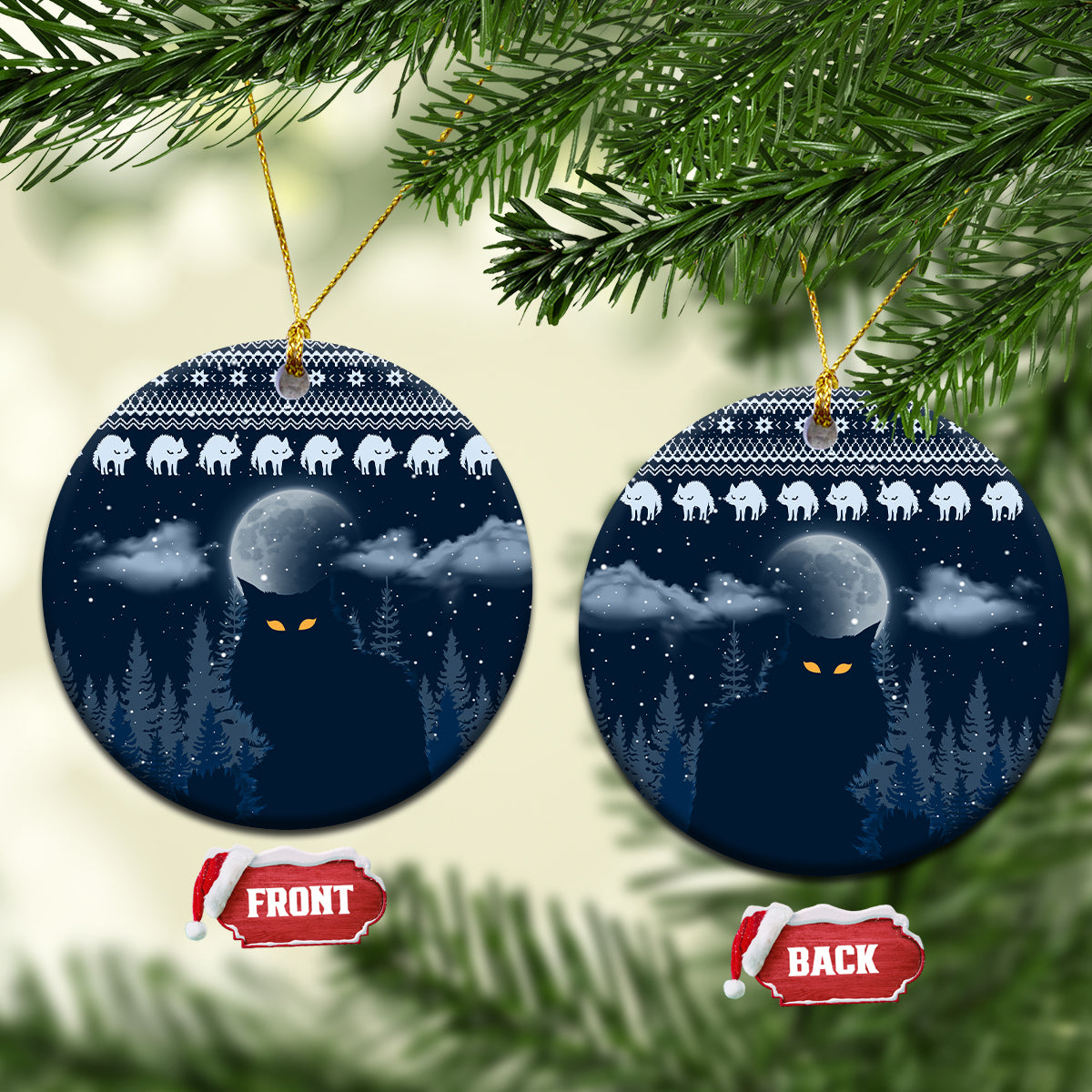 Blue ceramic Christmas ornament, round disc with snowy night forest and cat faces, gold hanger