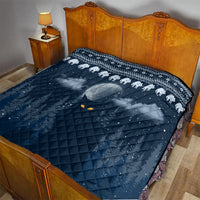 Blue cat Christmas quilt on bed with white cat border and diamond quilt pattern