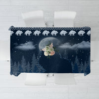 Dark blue Christmas tablecloth with snowy night scene and white cat border
