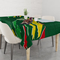 Green football tablecloth with Senegal flag print, draped over dining table