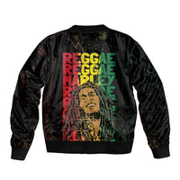 Unisex black bomber jacket with ribbed hem and back Reggae typeset graphic print