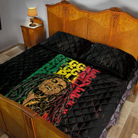 Black quilt with matching pillowcases, colorful reggae text and face graphic, diamond pattern