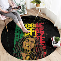 Round black grunge carpet with large 'REGGAE MARLEY' lettering in green, red, yellow
