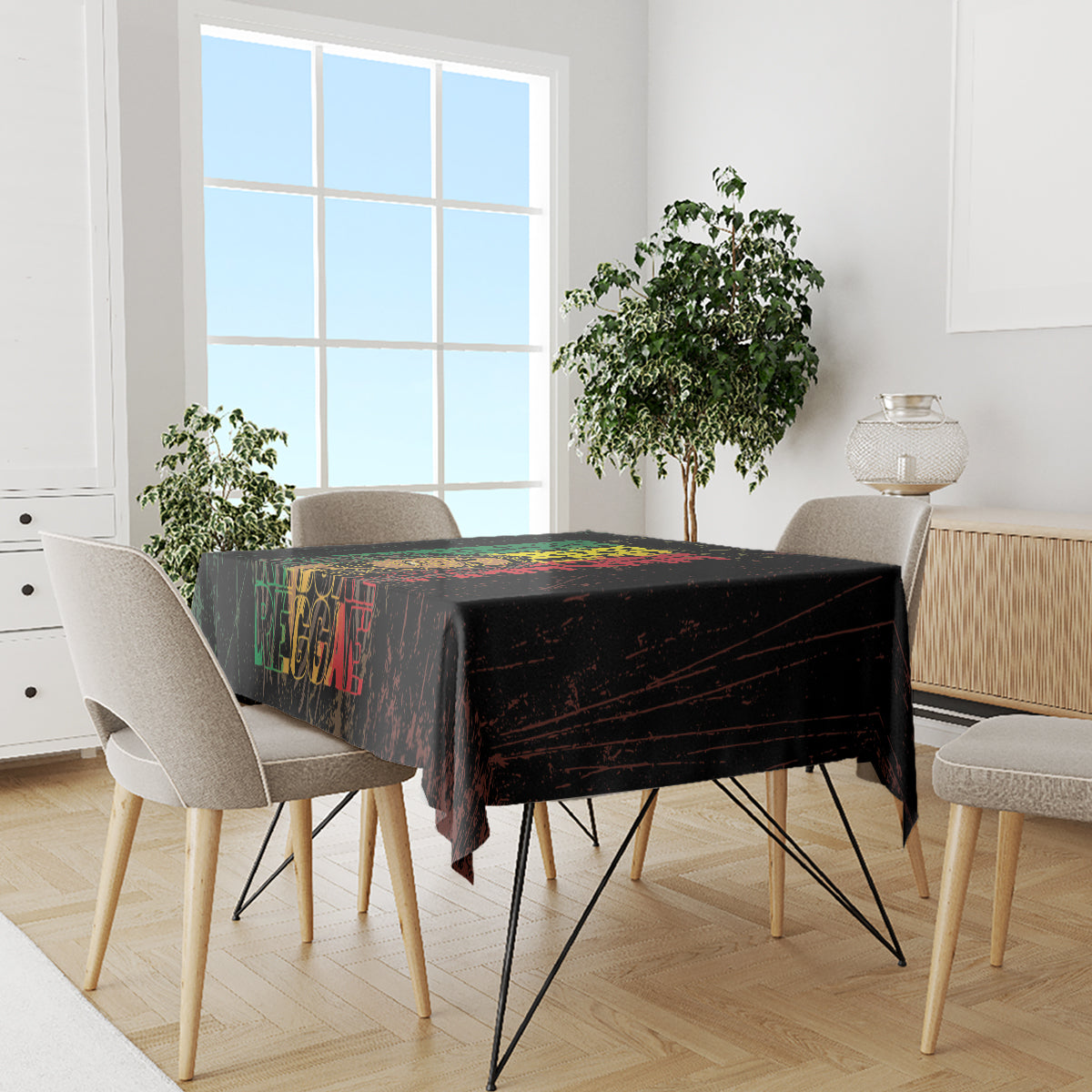 Black tablecloth with distressed reggae text across the dining table surface.