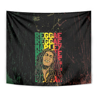 Reggae wall tapestry close-up with layered “REGGAE MARLEY” text in green, red, and gold