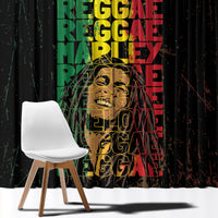 Black Marley window curtain close-up with layered reggae grunge lettering in green, red, yellow