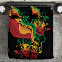Black bedding set with two pillows featuring “One Love One Heart” reggae-style graphic
