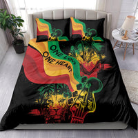 Black comforter set with two pillows, colorful reggae “One Love One Heart” artwork