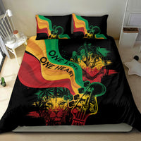 Black bedding set with two pillows showing colorful reggae “One Love One Heart” print