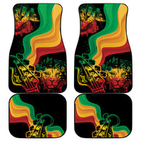 Set of four car floor mats with colorful reggae artwork and black border