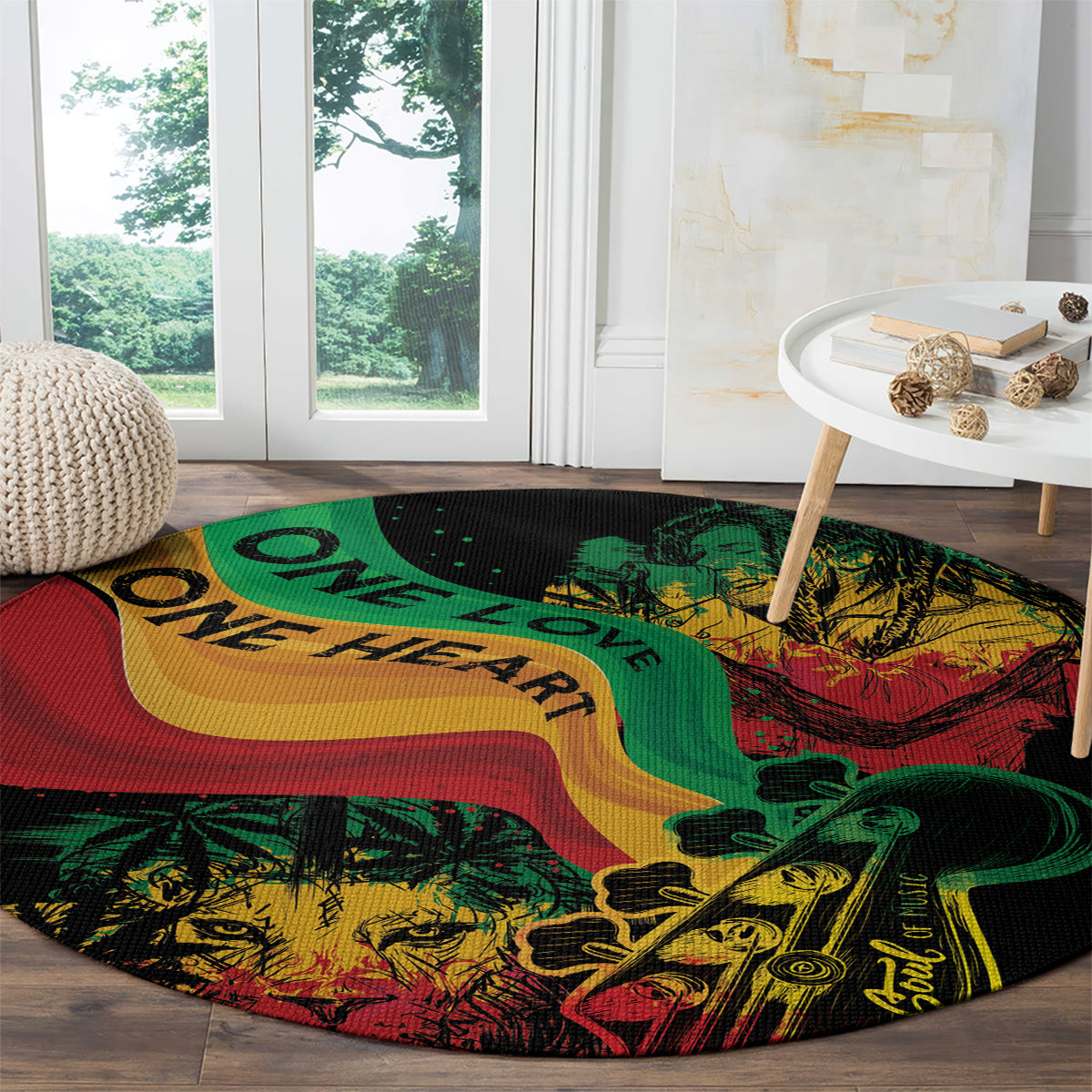 Round area rug with reggae-style illustrated face and swirling red, green, yellow One Love text