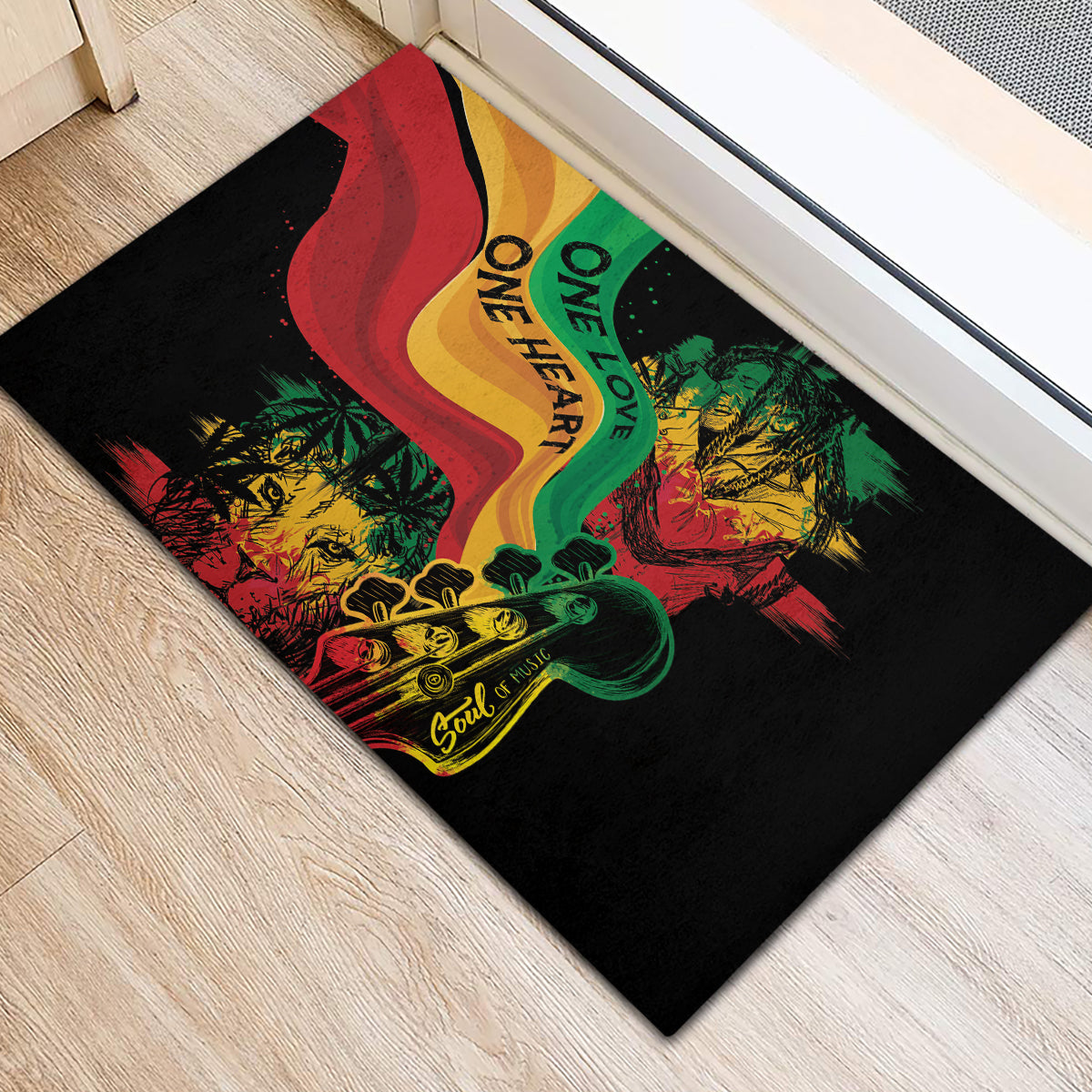 Black rubber doormat with colorful wave and music-themed reggae text 'ONE LOVE'