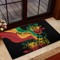 Black rubber doormat with reggae man silhouette and 'ONE LOVE'/'ONE HEART' lettering