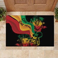 Black rectangular rubber doormat with reggae illustration and 'ONE LOVE ONE HEART'