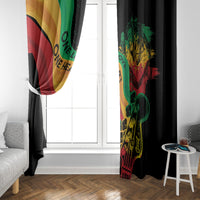 Reggae window curtain panels with red, yellow, green flag design on black.