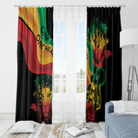 Reggae window curtain panels with lion graphic and red, yellow, green flag colors on black.