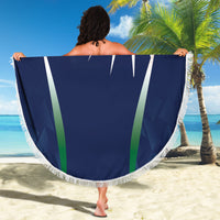 Blue India beach blanket held up, round with fringed edge and 'INDIA' emblem