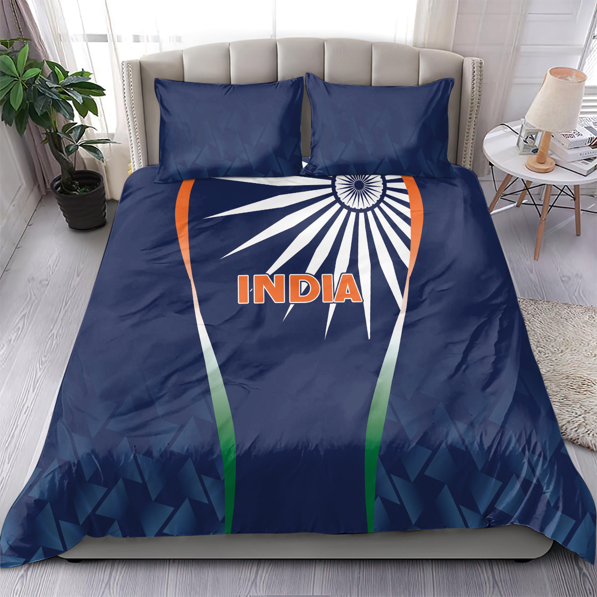 Blue India-themed bedding set with duvet and two pillows, sunburst graphic centered