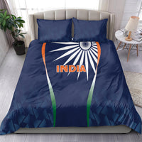 Blue India-themed bedding set with duvet and two pillows, sunburst graphic centered