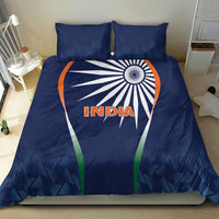 Blue India-themed duvet set with two pillows, bold sunburst graphic and tricolor accents